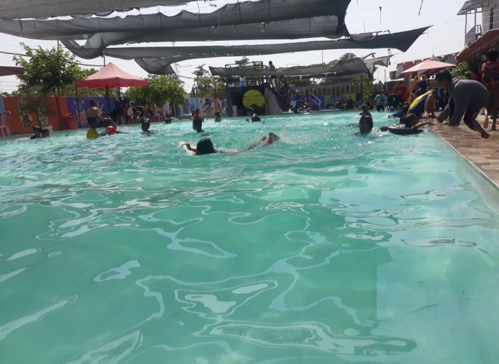 rekreasi bersama keluarga